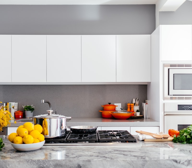 Kitchen with a fridge and cooker
