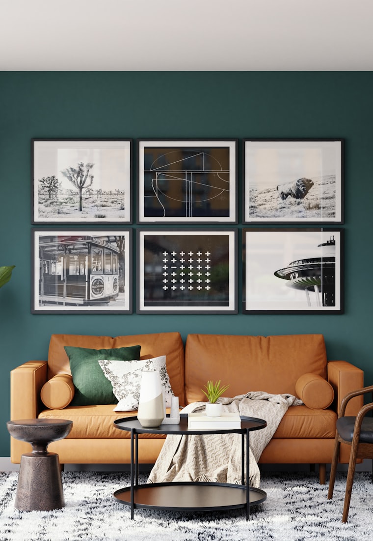 Living room furnished with a tan leather sofa and side table